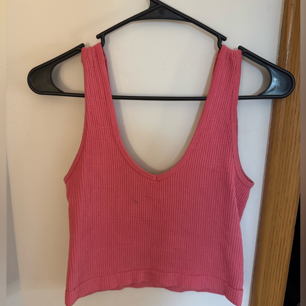 Pink waffle knit cropped tank top.